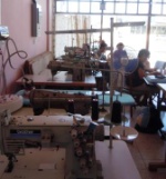 former cloth fabric hall with industrial sewing machines
